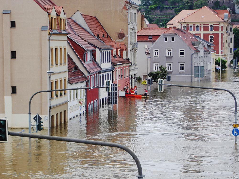 Free heavy flooding in a town image, public domain natural disaster CC0 photo.