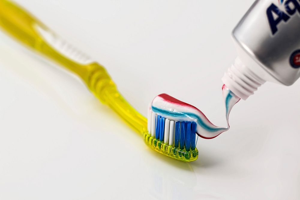 Free toothpaste and toothbrush image, public domain CC0 photo.