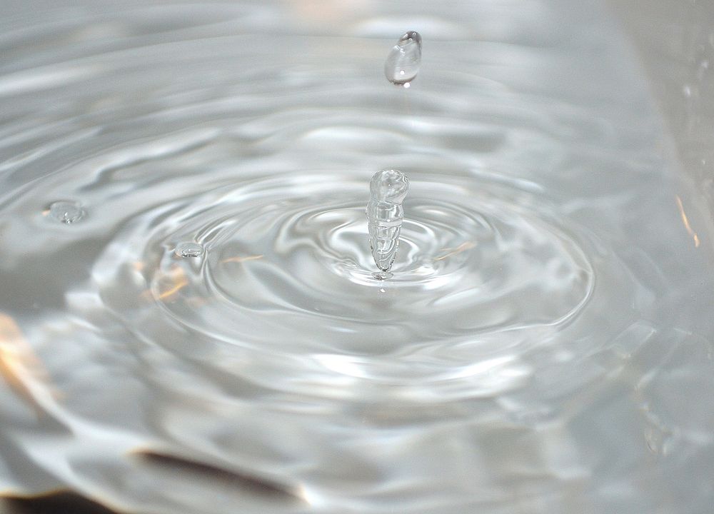 Water ripples background, free public domain CC0 image.