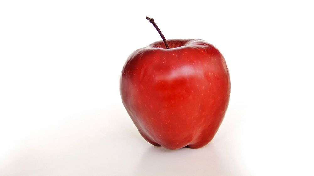 Free closeup of red apple on white background image, public domain CC0 photo.