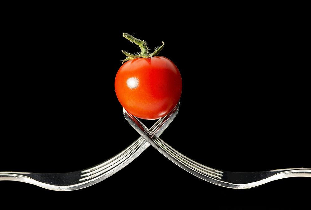 Free tomato on two forks image, public domain CC0 photo.