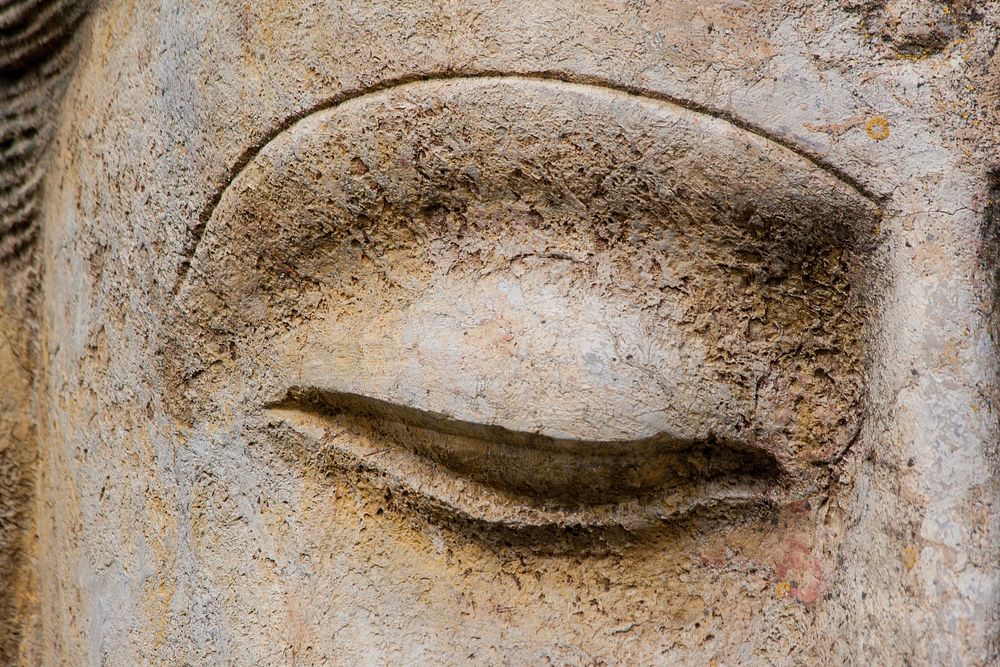 Free Siddhartha Gautama statue, eye closeup photo, public domain religion CC0 image.