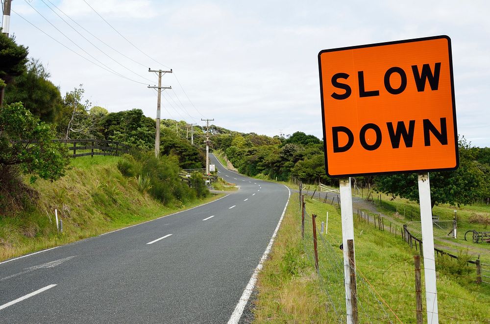 Free slow down road sign image, public domain CC0 photo.