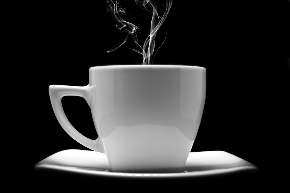 Free hot coffee white cup in black background photo, public domain beverage CC0 image.