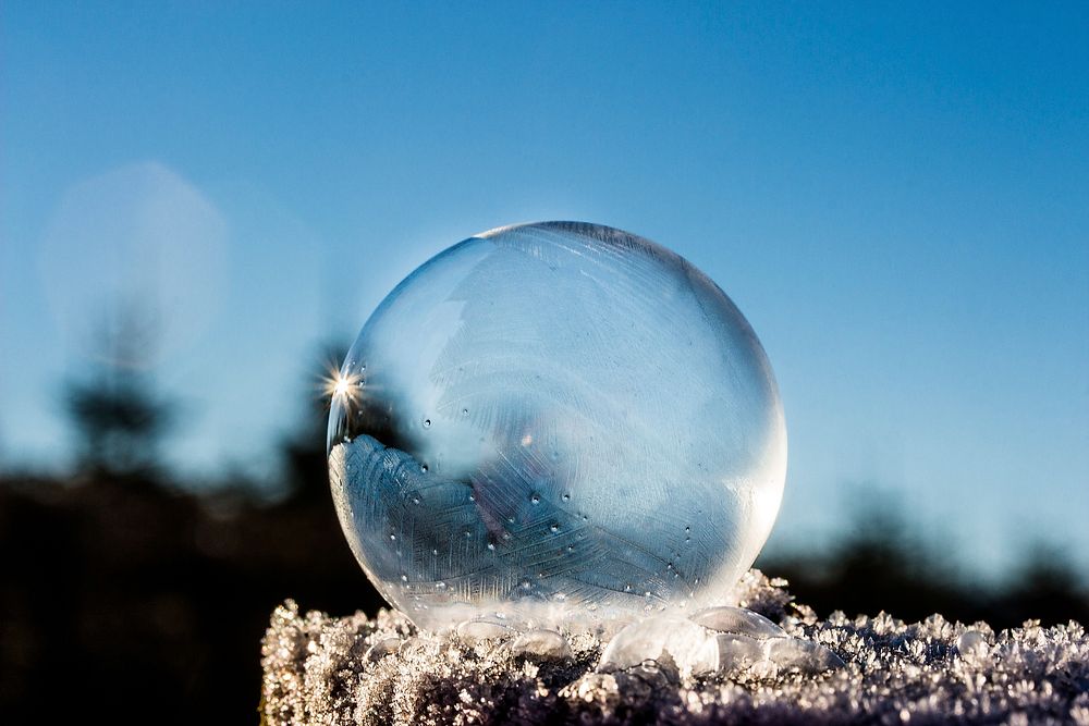 Frozen ice sphere shape photo, free public domain CC0 image.