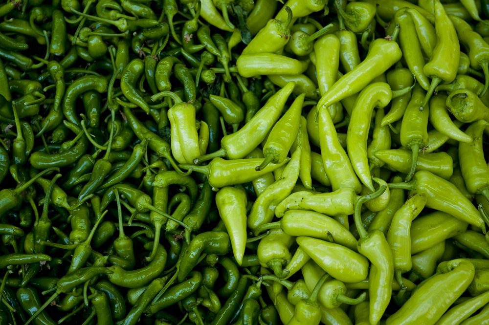 Free pile of green chillies and green pepperonis photo, public domain food CC0 image.