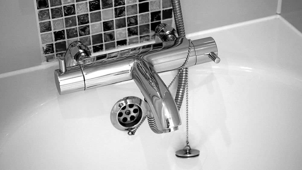 Free bathtub faucet image, public domain bathroom CC0 photo.