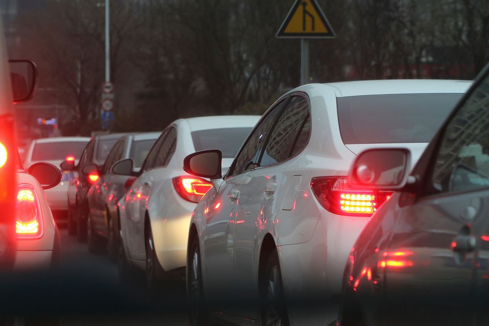 Free car taillight in traffic image, public domain car CC0 photo.