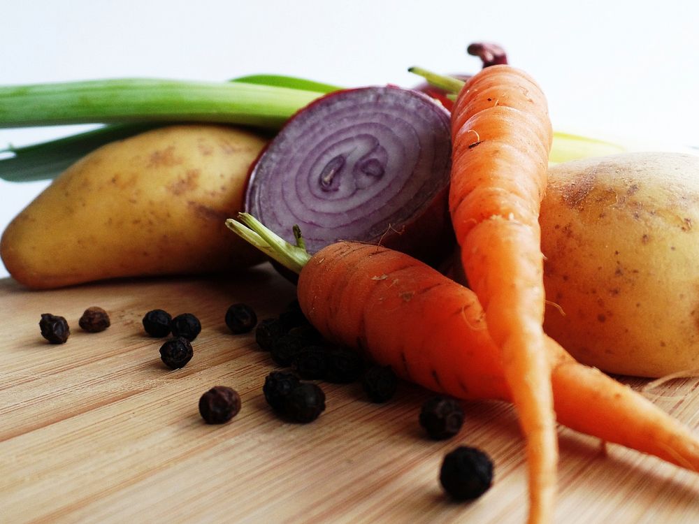 Free closeup on fresh vegetables on cutting board photo, public domain food CC0 image.