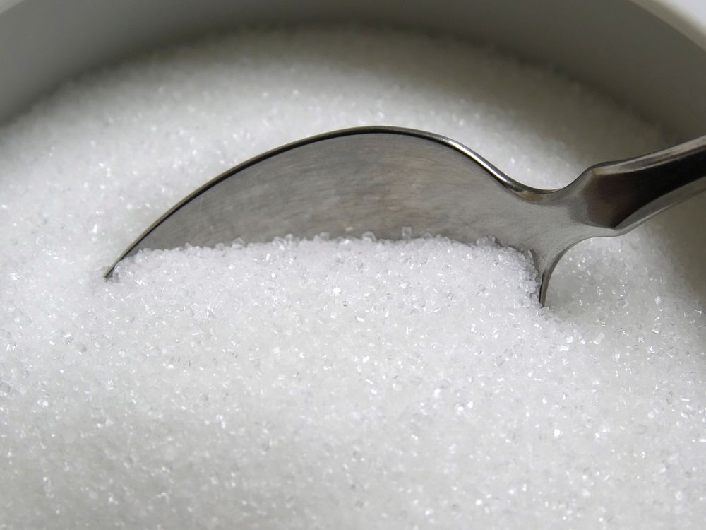 Free sugar in a spoon public domain CC0 photo.