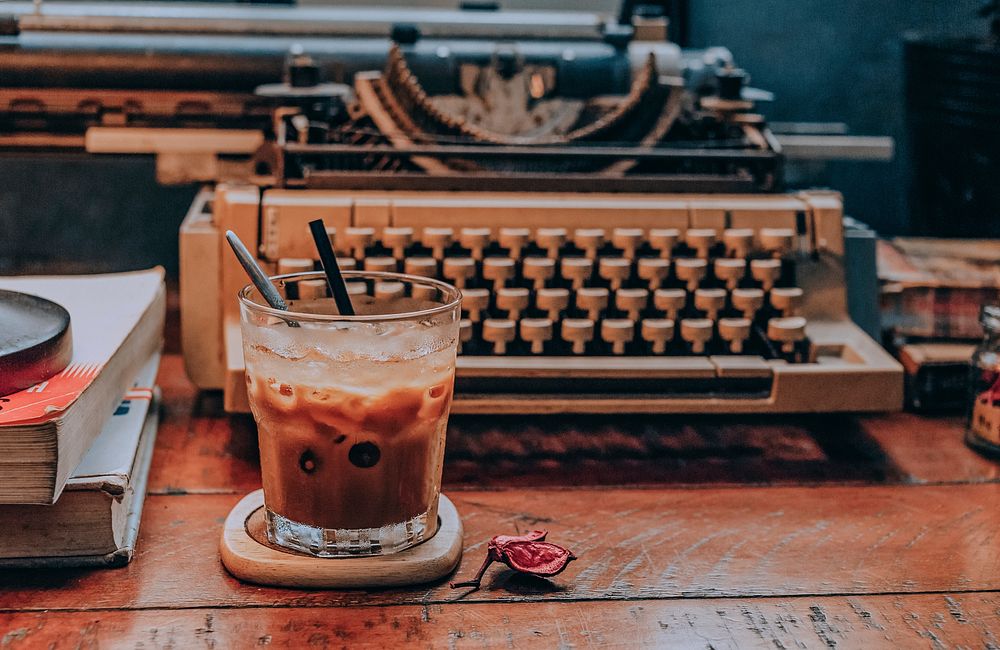 Free coffee cup and typewriter photo, public domain beverage CC0 image.