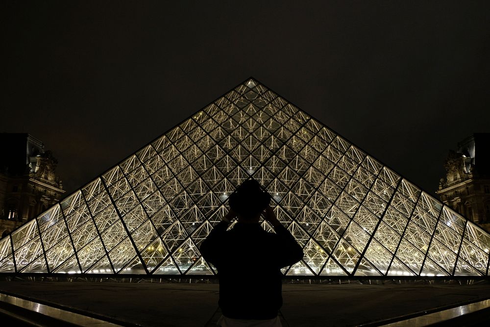 Free Louvre Pyramid at night photo, public domain building CC0 image.