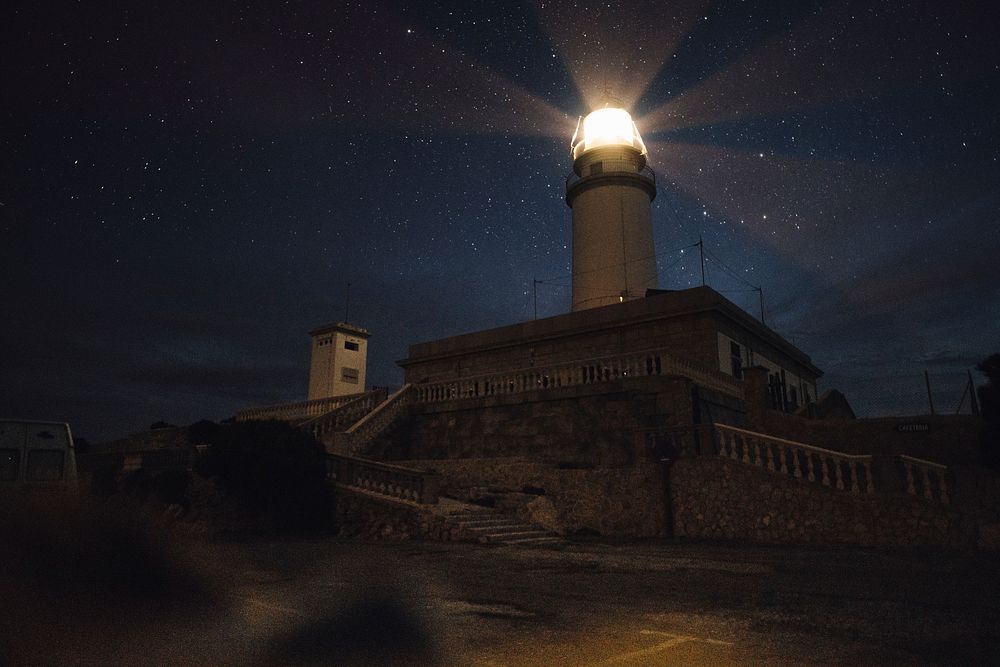 Free lighthouse at night image, public domain building CC0 photo.