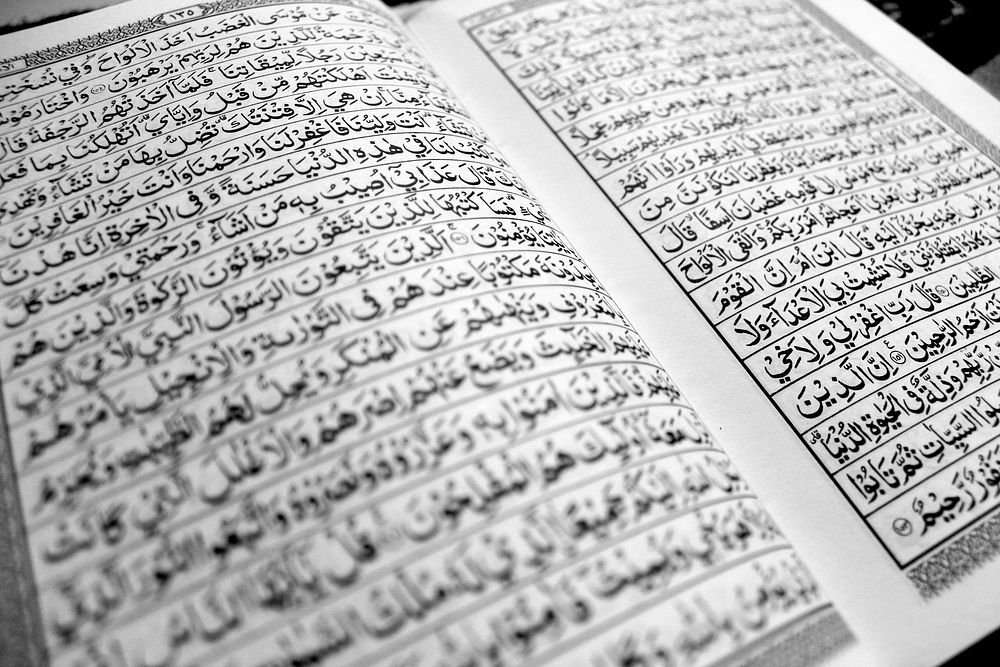 Free The Quran Koran Islam page closeup image, public domain CC0 photo.