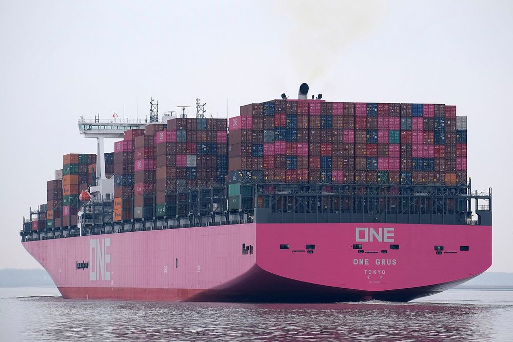 Pink cargo ship in sea, location unknown, 22 March 2019. View public domain image source here