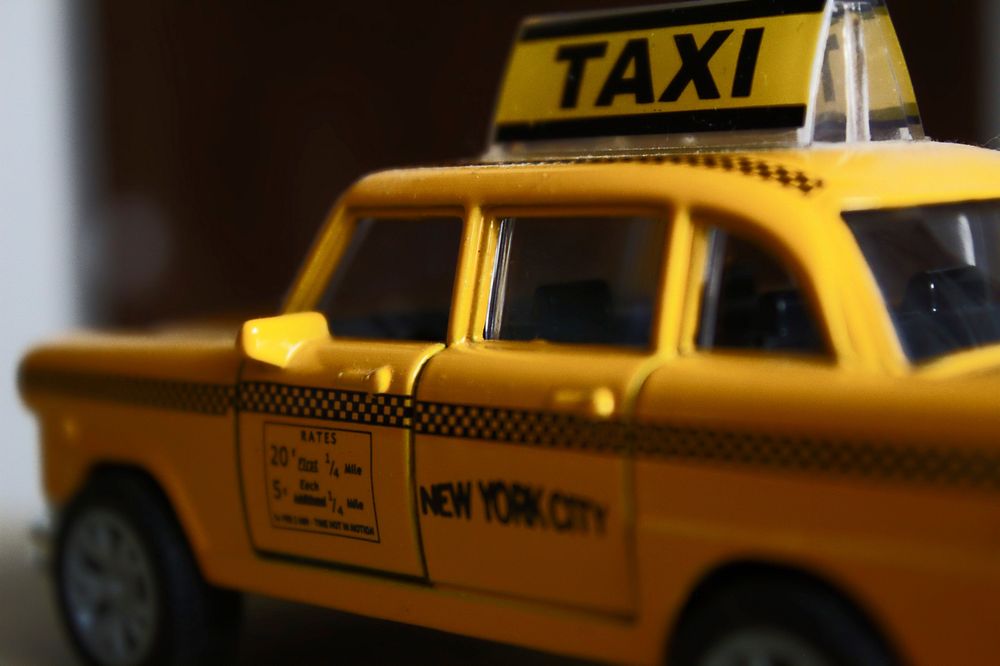 Free yellow taxi car toy image, public domain car CC0 photo.