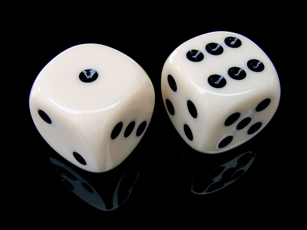 White dice, gambling, table top game, free public domain CC0 photo.