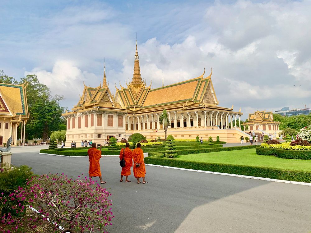 Thai monks in a temple. Free public domain CC0 photo.