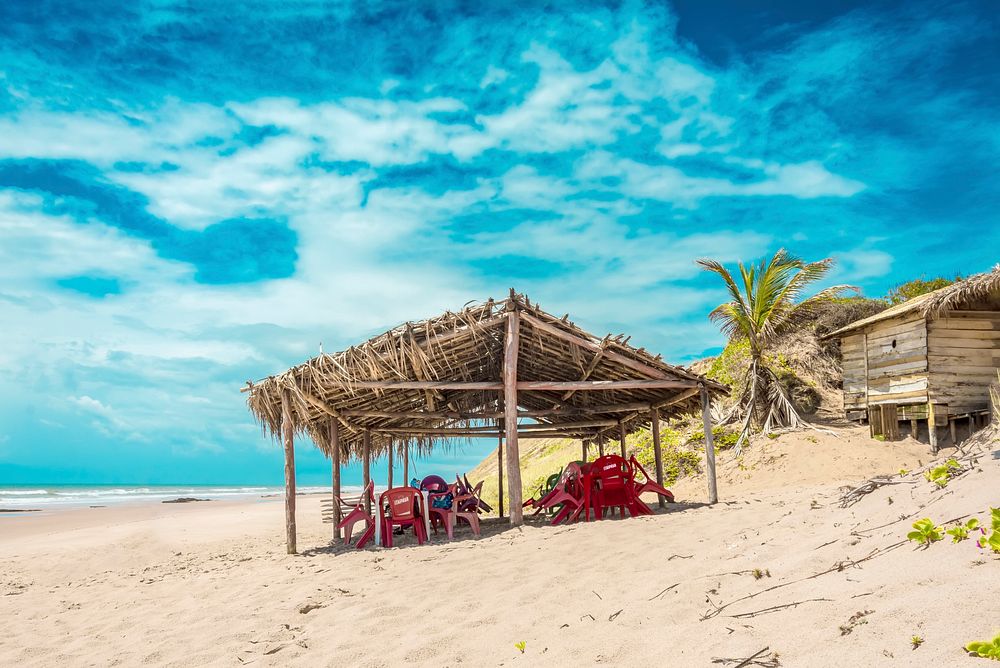 Beach cloudy blue sky landscape, free public domain CC0 photo.