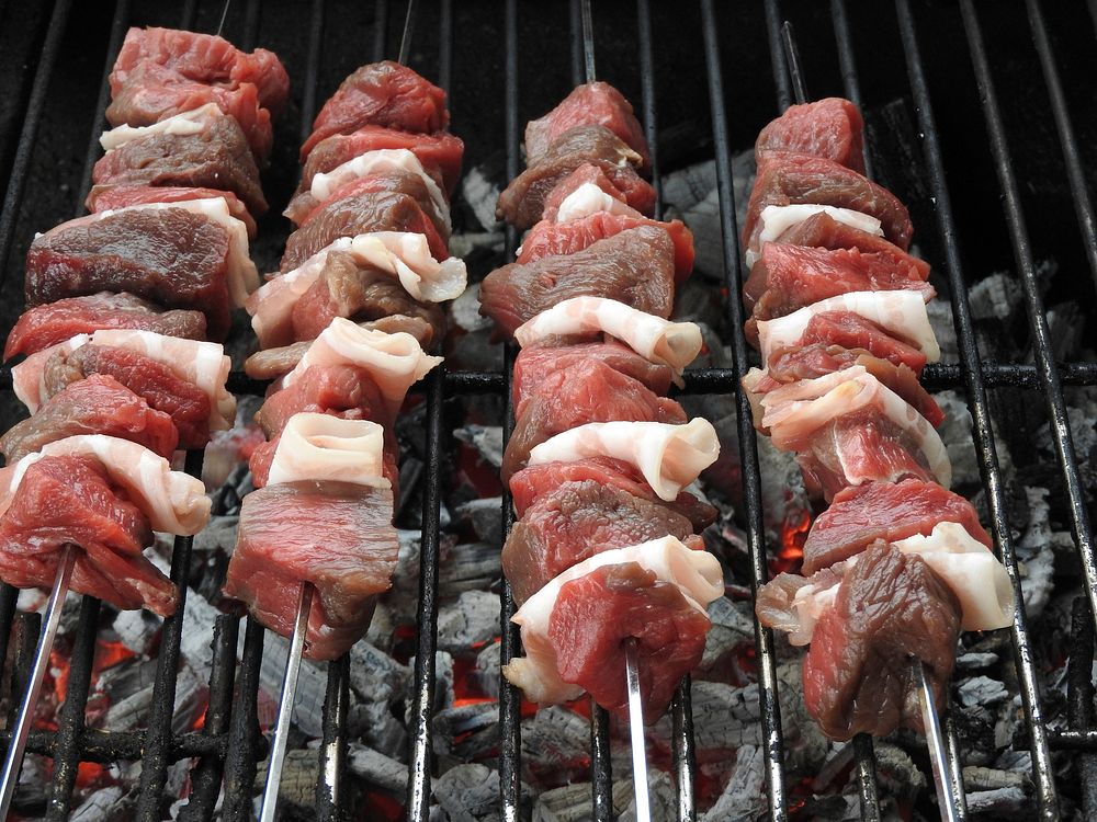 Raw barbeques on griller. Free public domain CC0 photo.