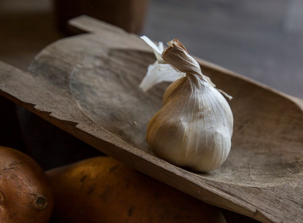 Free garlic in wooden bowl image, public domain food CC0 photo.