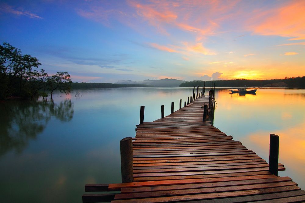 Free wooden pier at sunset photo, public domain lake CC0 image.