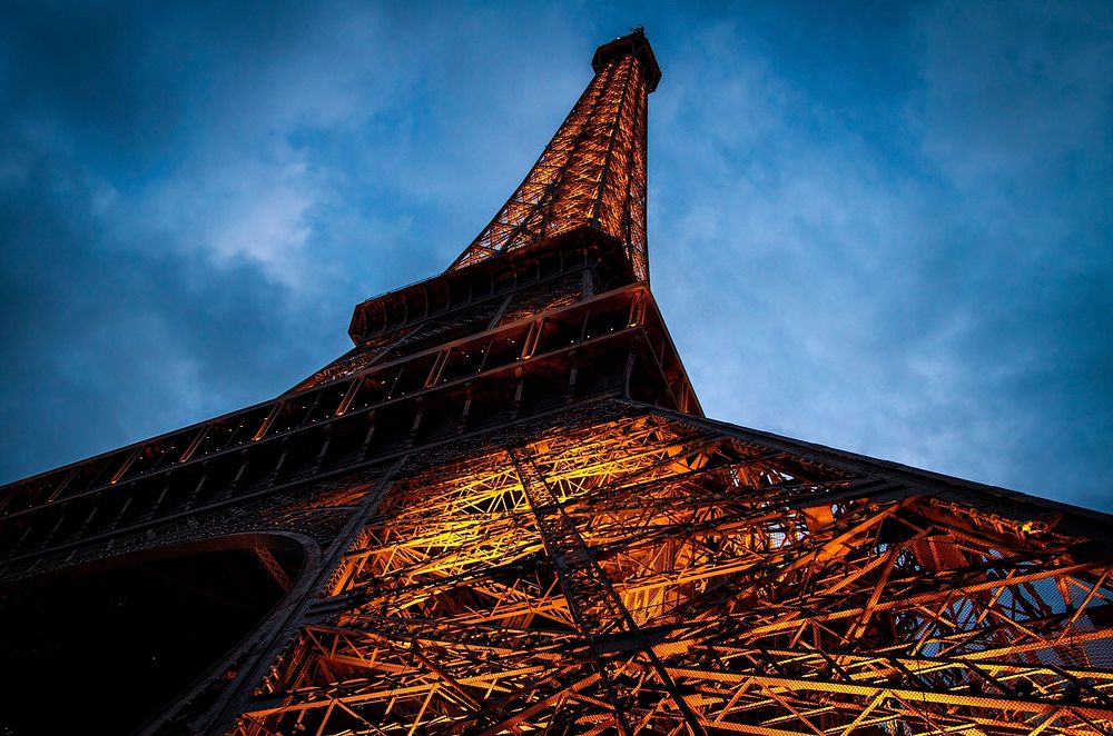 Free closeup on lit up Paris Eiffel Tower photo, public domain building CC0 image.
