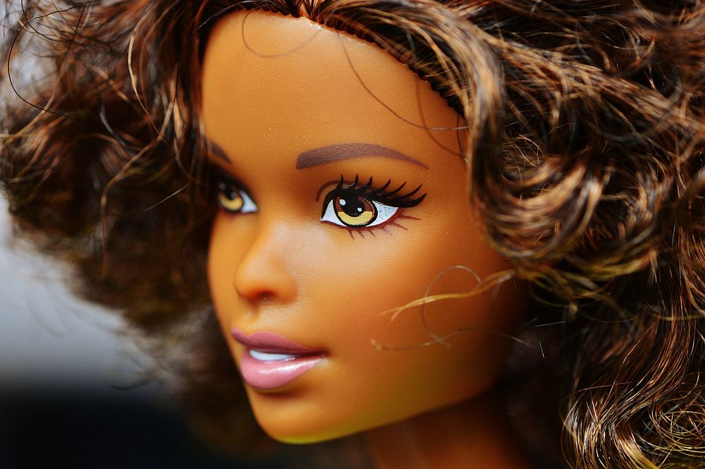 Barbie brown hair head close up photo, free public domain CC0 image.