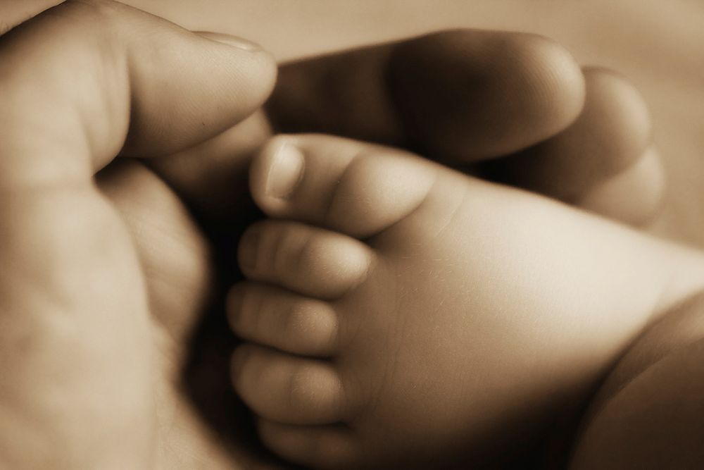 Free father holding baby's hand image, public domain CC0.