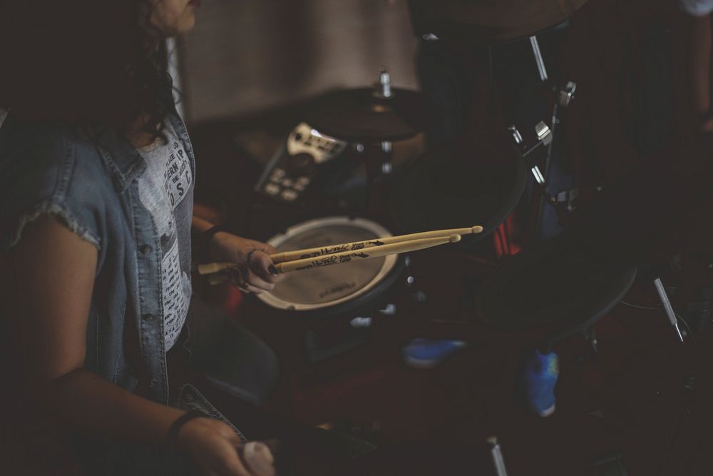 Woman playing drum image, public domain music CC0 photo.