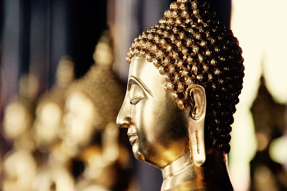 Golden Buddha statue head close up, free public domain CC0 photo.