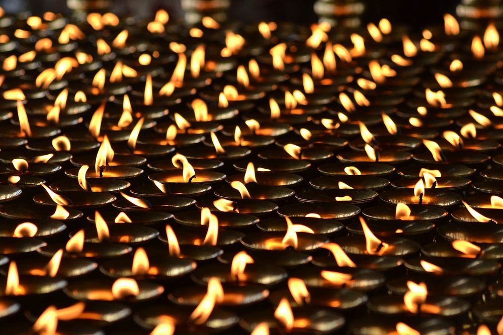 Free many candle lights in the dark photo, public domain CC0 image.