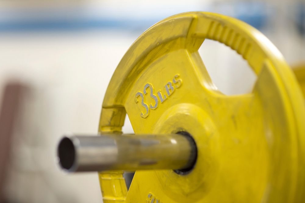 Weights in gym, free public domain CC0 image.