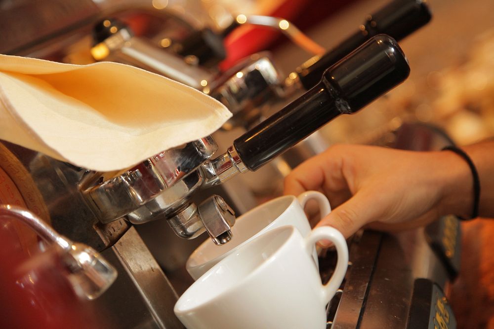 Free barista making coffee process photo, public domain beverage CC0 image.