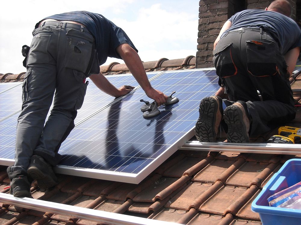 Free solar panel installation crew image, public domain CC0 photo.