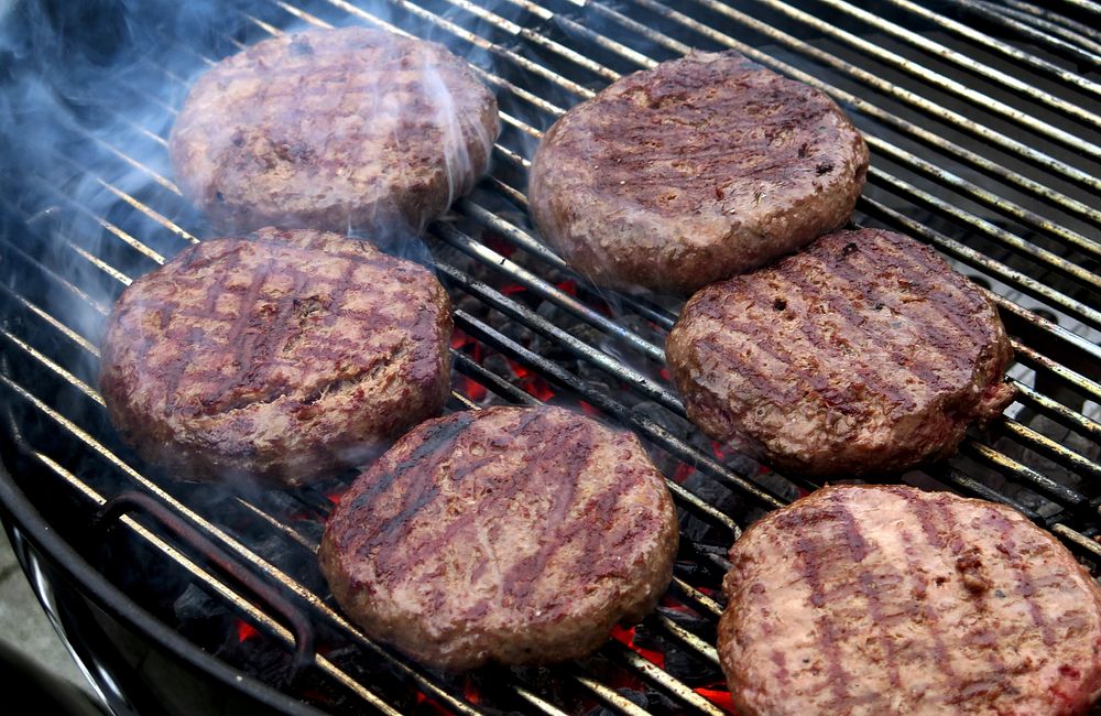 Free burger patty on a grill image, public domain food CC0 photo.