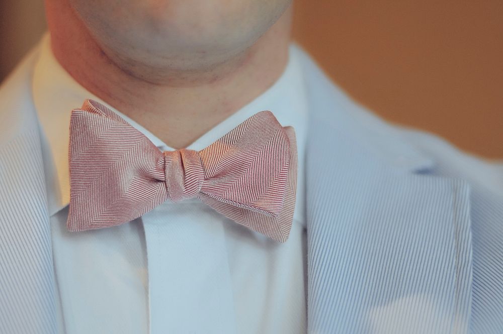 Man wearing bow tie and suit, free public domain CC0 photo