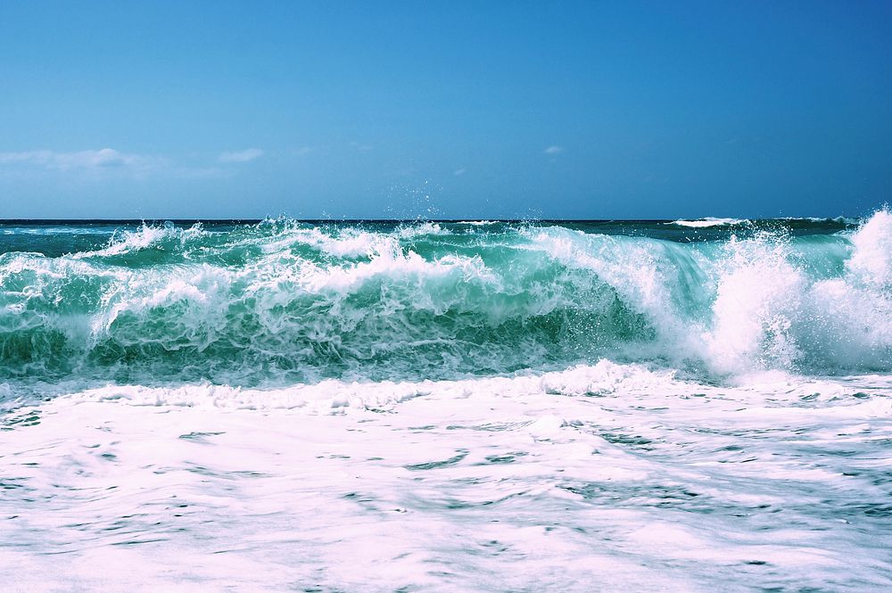 Ocean waves crashing shoreline, blue sea photo, free public domain CC0 image.