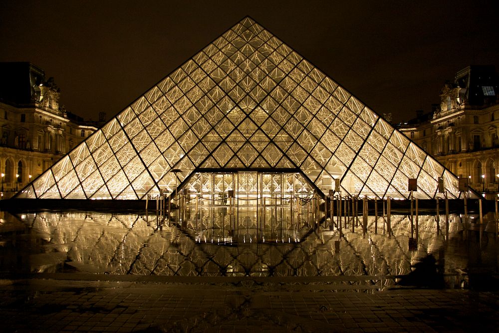 Free Louvre Pyramid at night photo, public domain building CC0 image. 