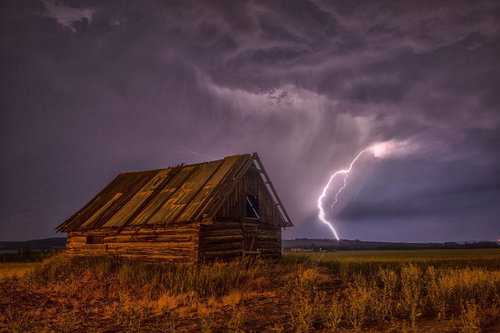 Thunder storm lightning city night photo, free public domain CC0 image.