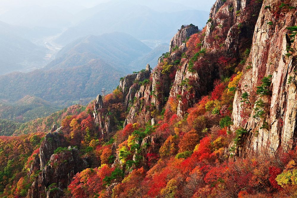 Hilly region in autumn landscape photo, free public domain CC0 image.