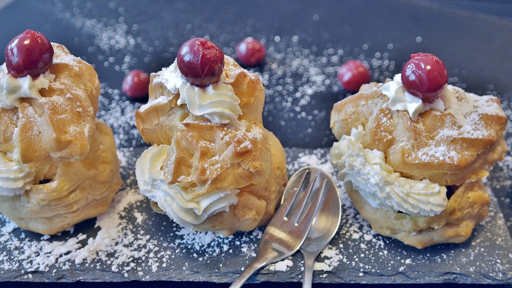 Free cream puffs with cherries on top image, public domain dessert CC0 photo.