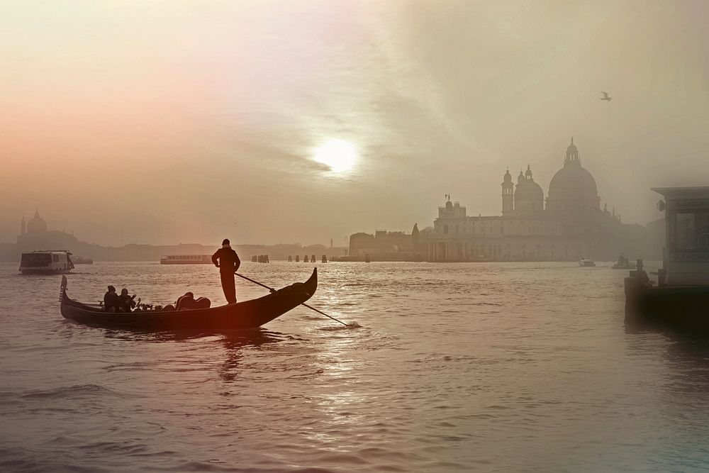 Free man paddling on a gondola image, public domain CC0 photo.