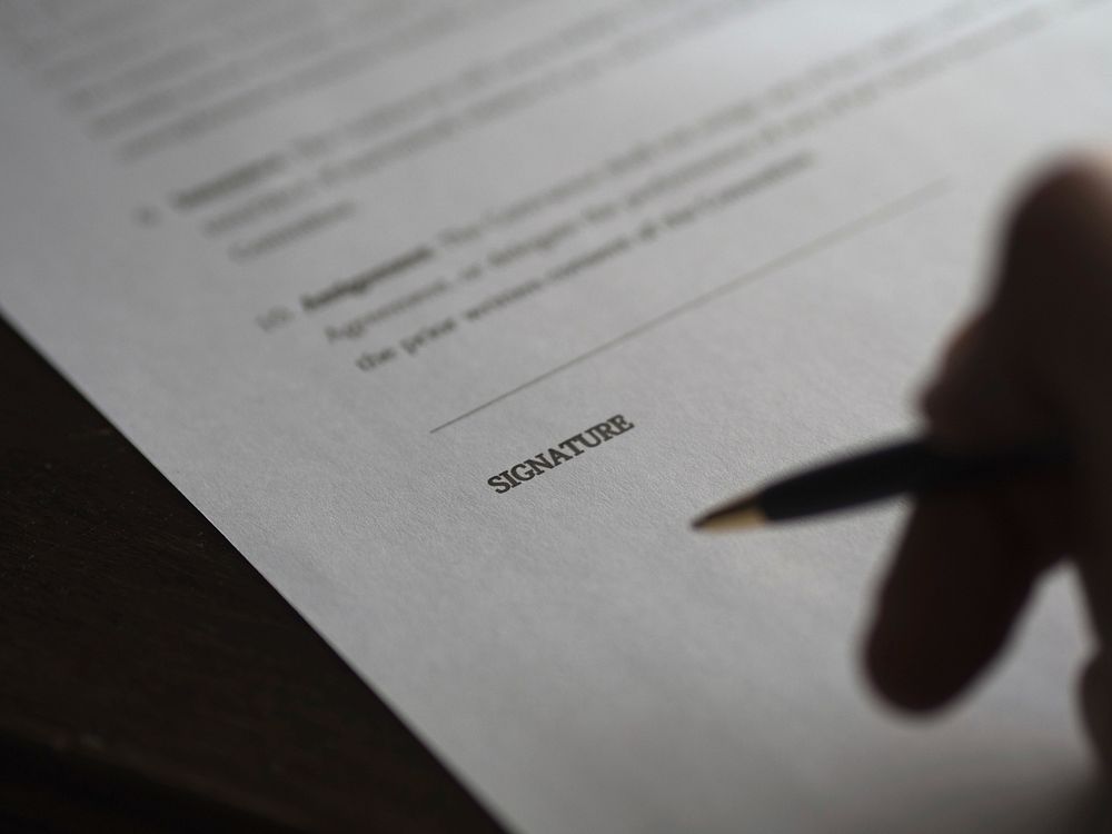 Signing a contract, free public domain CC0 photo