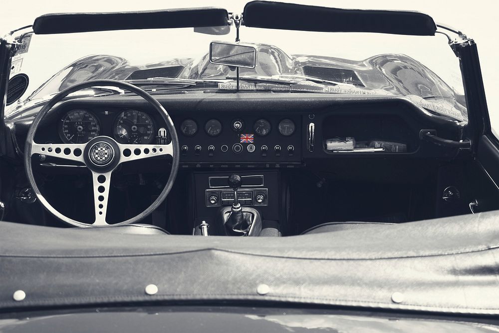 Car interior, steering wheel photo, free public domain CC0 image.