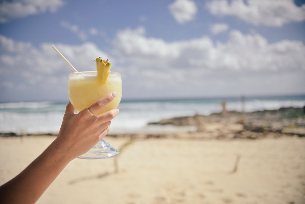 Free pina colada in beach background photo, public domain beverage CC0 image.