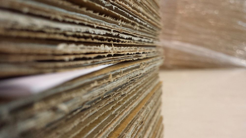 Free stack of cardboard image, public domain material CC0 photo.