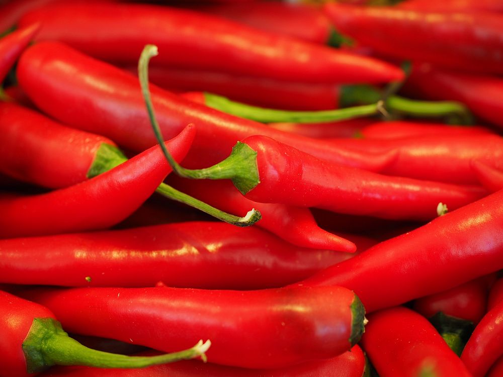 Free pile of red chili peppers image, public domain vegetables CC0 photo.
