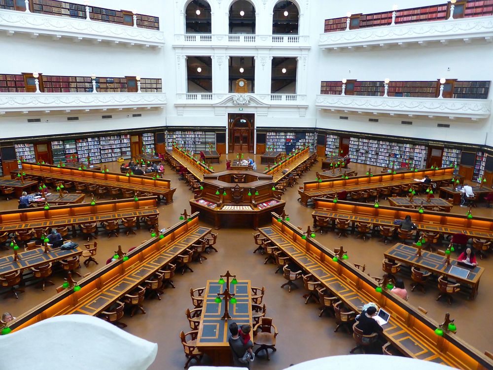 Free big open, multiple level library full of books photo, public domain CC0 image.