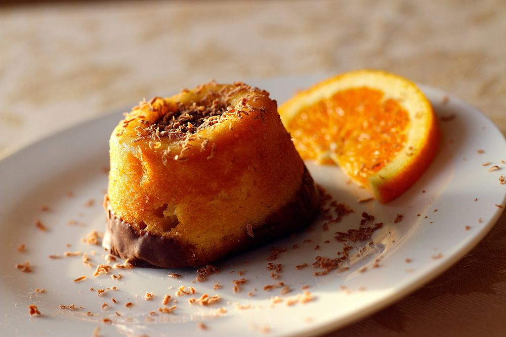 Free orange cake on plate image, public domain dessert CC0 photo.